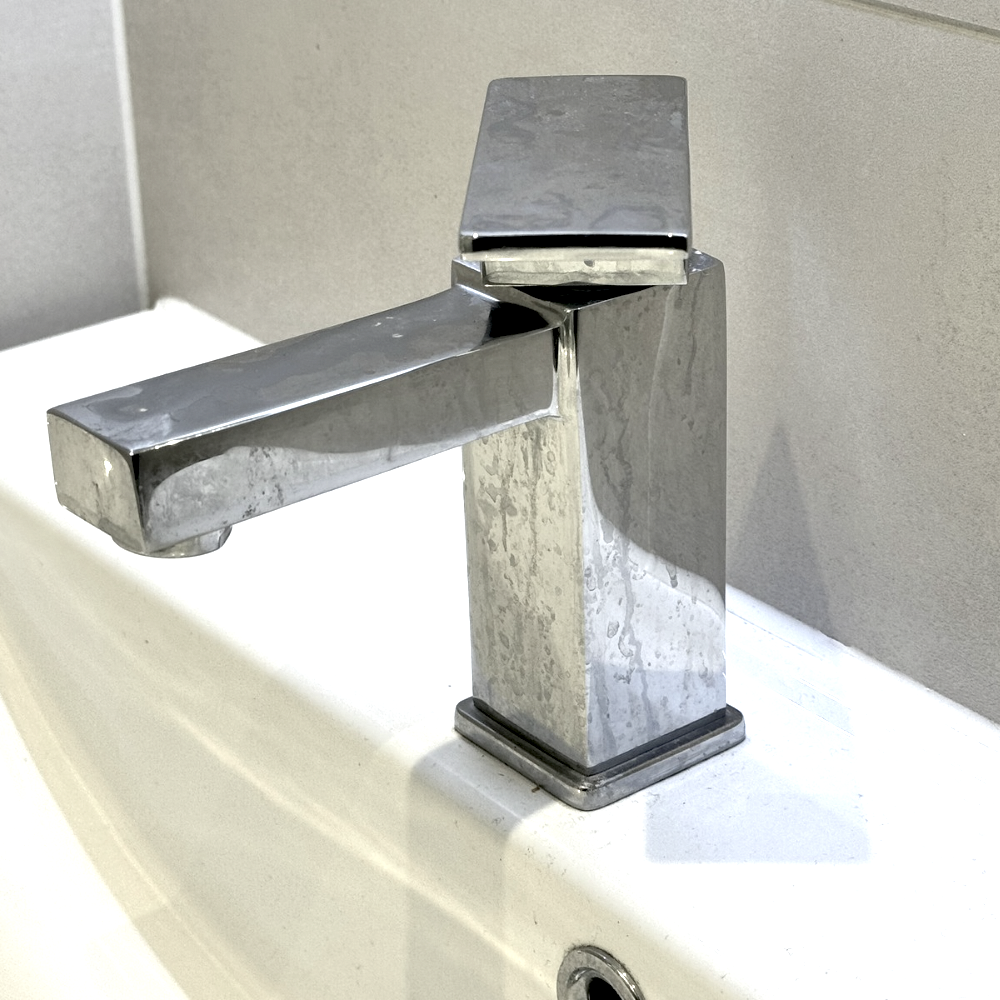 Bathroom Tap With Lime Scale And Grime Before Being Cleaned With Bathroom Magic